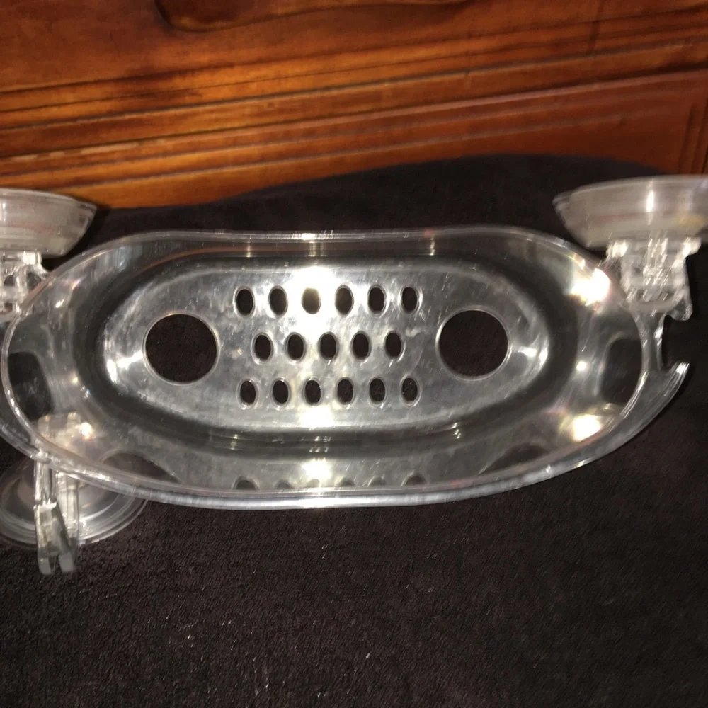 Clear suctioning bathroom caddy and hook